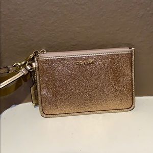 Coach gold sparkle wristlet